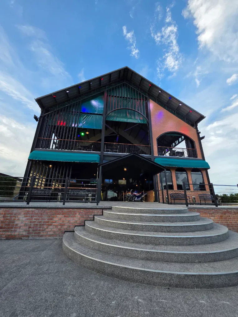 The Box Box sports restaurant floodlit at night